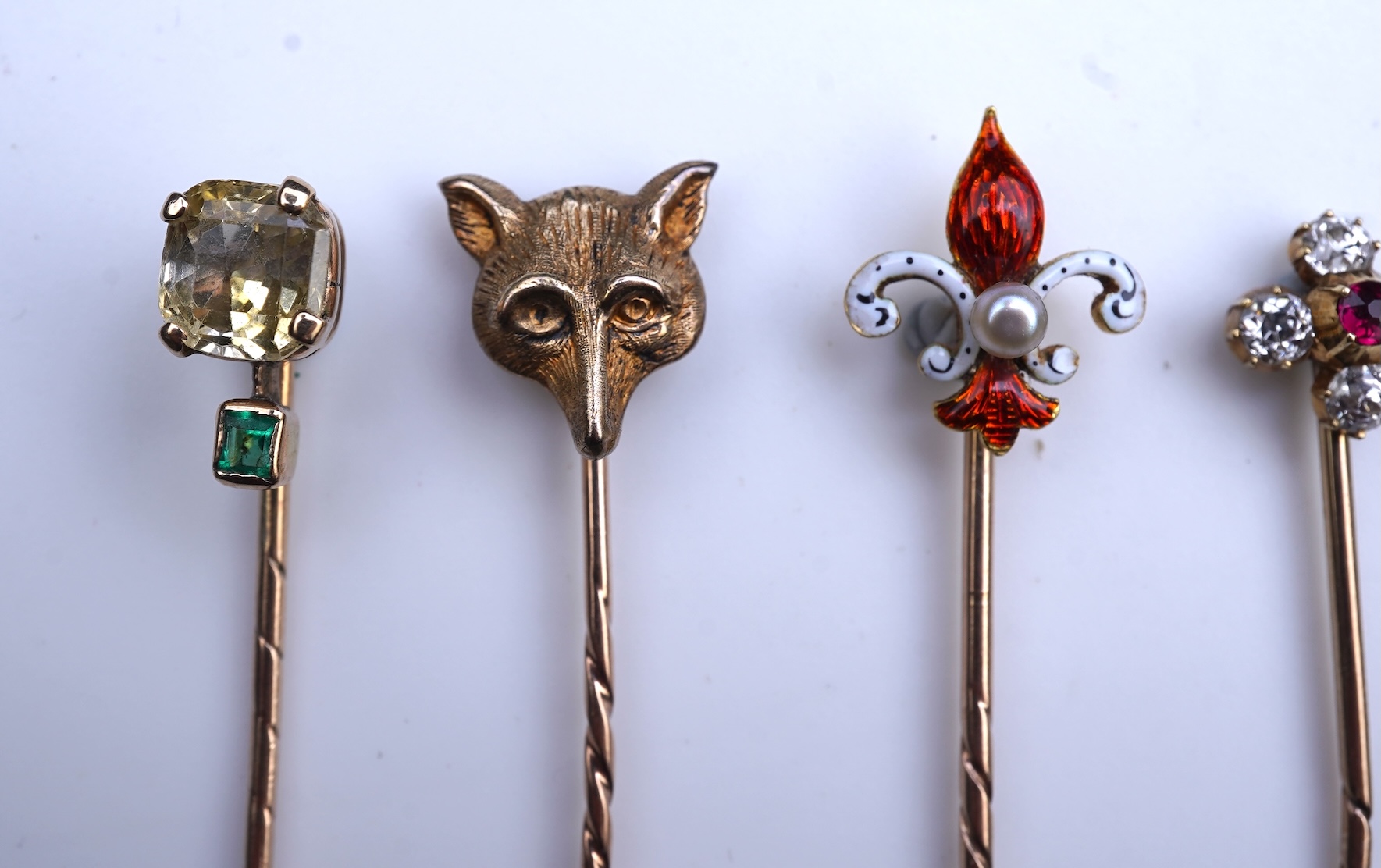 A collection of eight tie pins, 19th and 20th century
